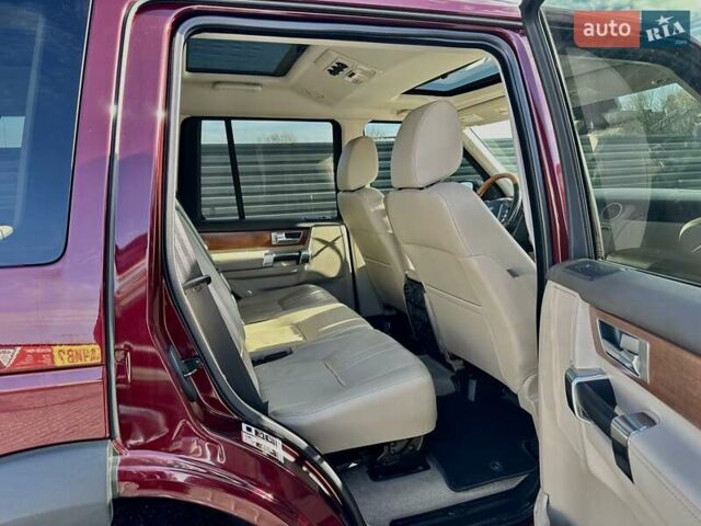 Красный Ленд Ровер Дискавери, объемом двигателя 3 л и пробегом 122 тыс. км за 24500 $, фото 6 на Automoto.ua