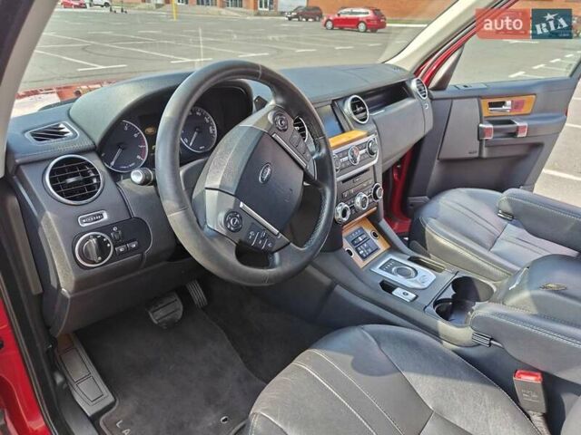 Красный Ленд Ровер Дискавери, объемом двигателя 3 л и пробегом 200 тыс. км за 16700 $, фото 12 на Automoto.ua