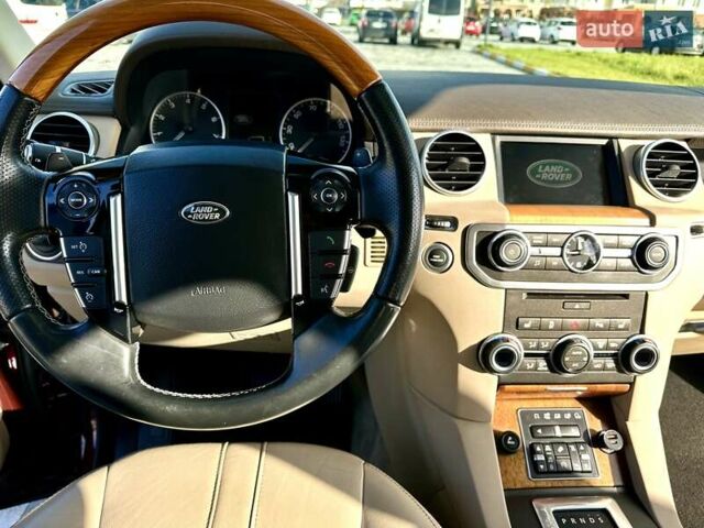 Красный Ленд Ровер Дискавери, объемом двигателя 3 л и пробегом 122 тыс. км за 24500 $, фото 3 на Automoto.ua