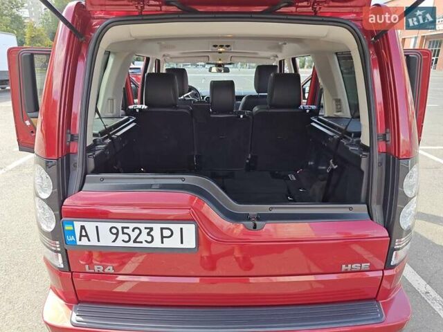 Красный Ленд Ровер Дискавери, объемом двигателя 3 л и пробегом 200 тыс. км за 16700 $, фото 14 на Automoto.ua