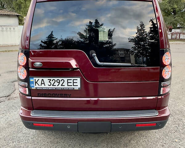 Красный Ленд Ровер Дискавери, объемом двигателя 2.99 л и пробегом 144 тыс. км за 25000 $, фото 3 на Automoto.ua