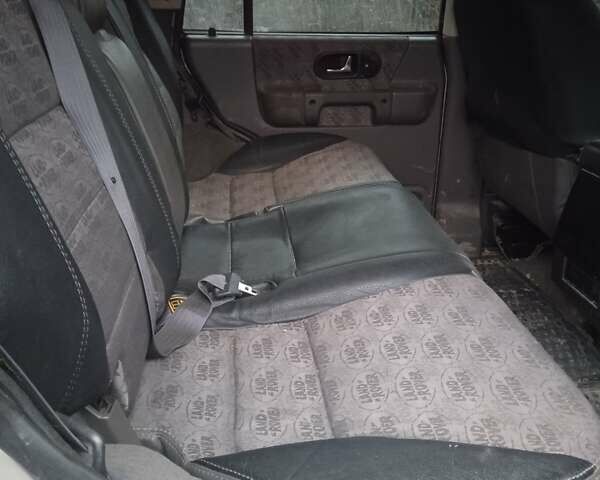 Сірий Ленд Ровер Діскавері, об'ємом двигуна 2.5 л та пробігом 350 тис. км за 10500 $, фото 3 на Automoto.ua