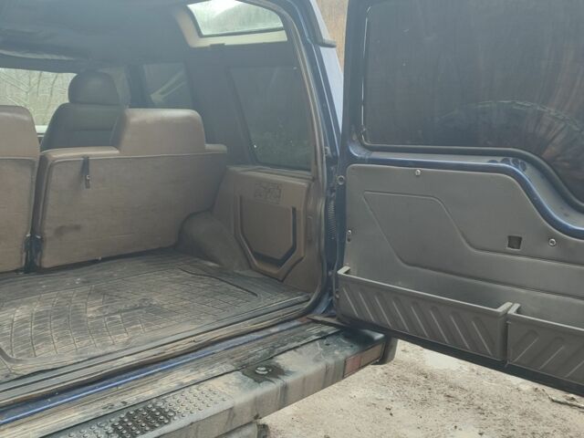 Синий Ленд Ровер Дискавери, объемом двигателя 2.5 л и пробегом 307 тыс. км за 7300 $, фото 4 на Automoto.ua