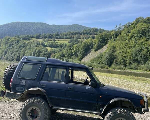 Синій Ленд Ровер Діскавері, об'ємом двигуна 2.5 л та пробігом 355 тис. км за 15000 $, фото 4 на Automoto.ua