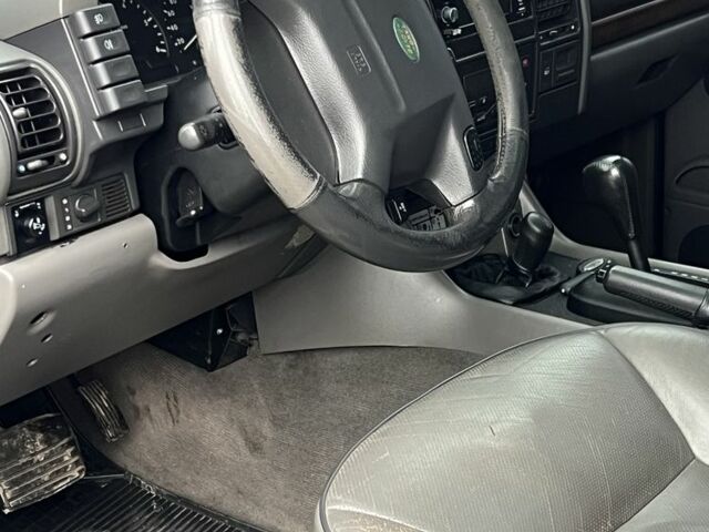 Синий Ленд Ровер Дискавери, объемом двигателя 2.5 л и пробегом 487 тыс. км за 5500 $, фото 6 на Automoto.ua