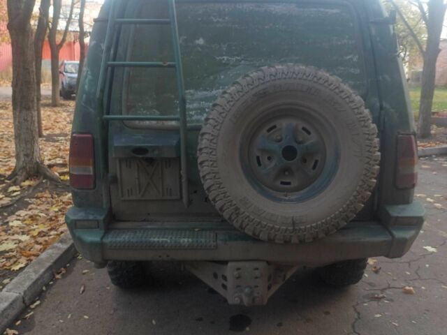 Зелений Ленд Ровер Діскавері, об'ємом двигуна 2.5 л та пробігом 300 тис. км за 1790 $, фото 4 на Automoto.ua