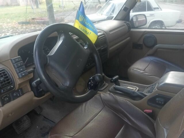 Зелений Ленд Ровер Діскавері, об'ємом двигуна 2.5 л та пробігом 300 тис. км за 1790 $, фото 11 на Automoto.ua