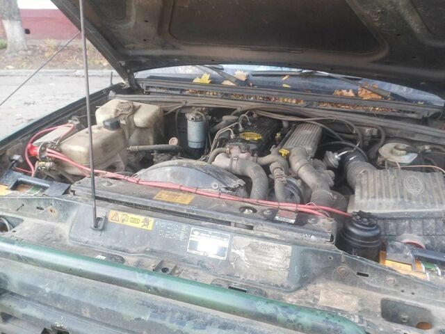 Зелений Ленд Ровер Діскавері, об'ємом двигуна 2.5 л та пробігом 300 тис. км за 1790 $, фото 6 на Automoto.ua