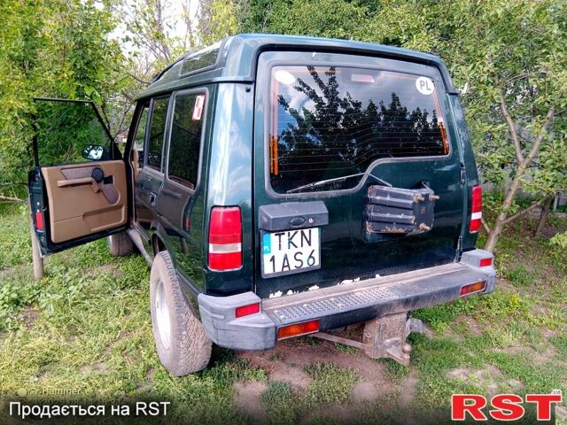 Зеленый Ленд Ровер Дискавери, объемом двигателя 2.5 л и пробегом 300 тыс. км за 2500 $, фото 1 на Automoto.ua