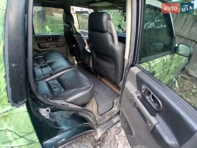 Зеленый Ленд Ровер Дискавери, объемом двигателя 2.5 л и пробегом 300 тыс. км за 8450 $, фото 12 на Automoto.ua