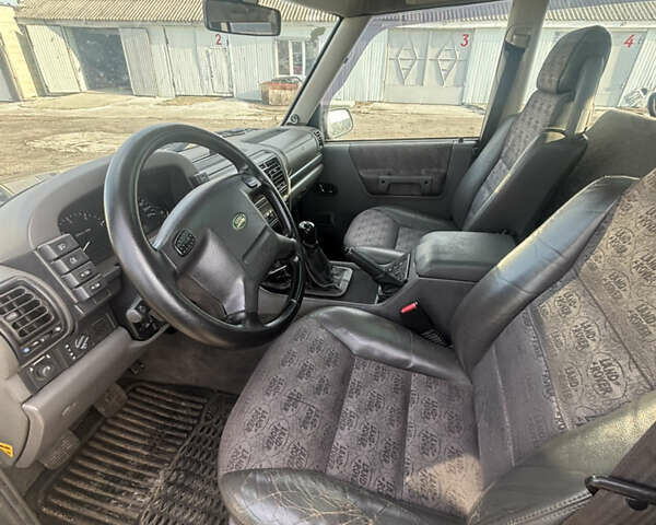 Зелений Ленд Ровер Діскавері, об'ємом двигуна 3.96 л та пробігом 200 тис. км за 5500 $, фото 5 на Automoto.ua