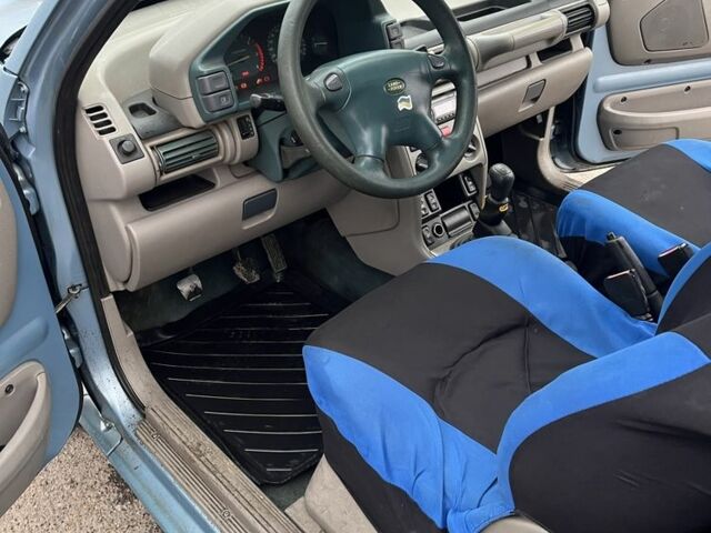 Синій Ленд Ровер Евок, об'ємом двигуна 2 л та пробігом 300 тис. км за 2400 $, фото 11 на Automoto.ua