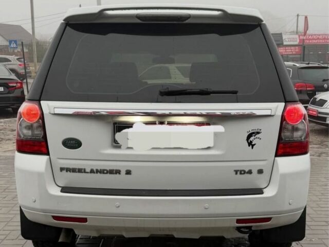 Белый Ленд Ровер Фрилендер, объемом двигателя 2.2 л и пробегом 297 тыс. км за 11000 $, фото 4 на Automoto.ua