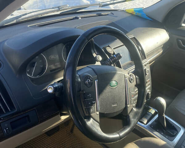Білий Ленд Ровер Freelander, об'ємом двигуна 2 л та пробігом 310 тис. км за 11800 $, фото 4 на Automoto.ua