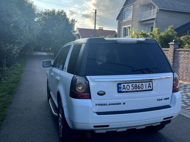 Білий Ленд Ровер Freelander, об'ємом двигуна 2.18 л та пробігом 290 тис. км за 15000 $, фото 5 на Automoto.ua