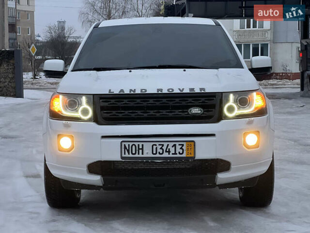 Білий Ленд Ровер Freelander, об'ємом двигуна 2.18 л та пробігом 225 тис. км за 12990 $, фото 26 на Automoto.ua