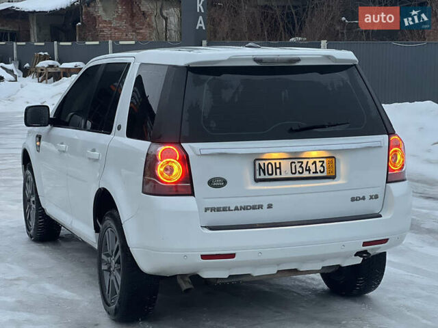 Білий Ленд Ровер Freelander, об'ємом двигуна 2.18 л та пробігом 225 тис. км за 12990 $, фото 29 на Automoto.ua