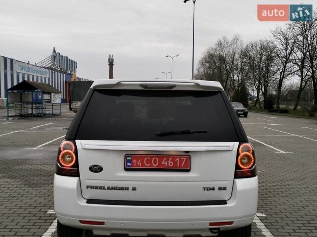 Білий Ленд Ровер Freelander, об'ємом двигуна 2.2 л та пробігом 227 тис. км за 12650 $, фото 11 на Automoto.ua