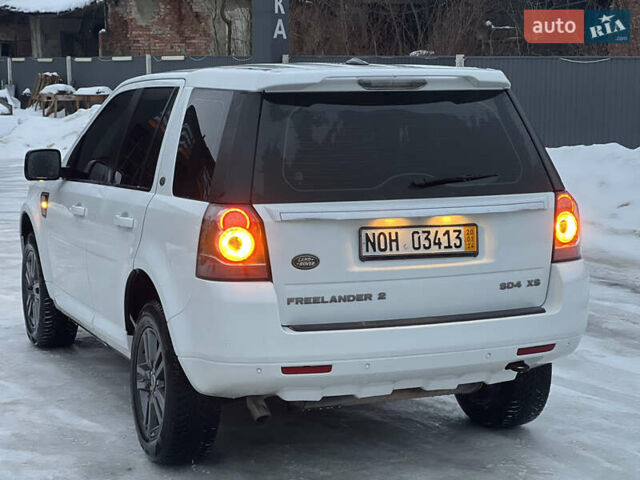 Білий Ленд Ровер Freelander, об'ємом двигуна 2.18 л та пробігом 225 тис. км за 12990 $, фото 30 на Automoto.ua