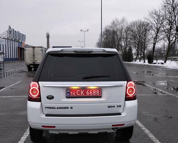 Білий Ленд Ровер Freelander, об'ємом двигуна 2.2 л та пробігом 225 тис. км за 14300 $, фото 14 на Automoto.ua