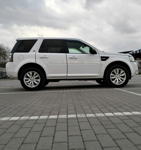 Білий Ленд Ровер Freelander, об'ємом двигуна 2.18 л та пробігом 227 тис. км за 13600 $, фото 25 на Automoto.ua