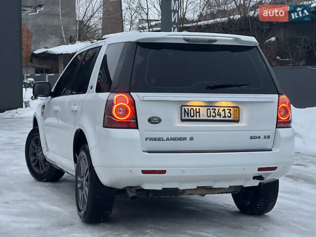 Білий Ленд Ровер Freelander, об'ємом двигуна 2.18 л та пробігом 225 тис. км за 12990 $, фото 10 на Automoto.ua