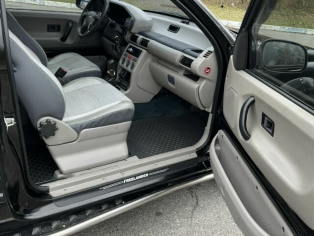 Черный Ленд Ровер Фрилендер, объемом двигателя 1.8 л и пробегом 183 тыс. км за 5500 $, фото 10 на Automoto.ua