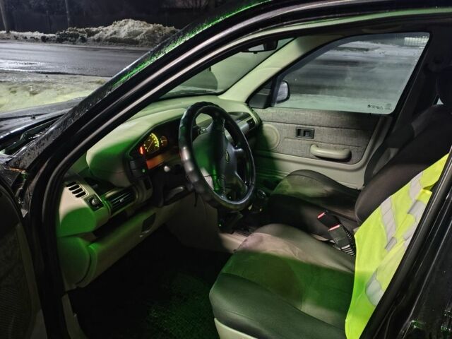 Черный Ленд Ровер Фрилендер, объемом двигателя 1.8 л и пробегом 200 тыс. км за 3850 $, фото 11 на Automoto.ua