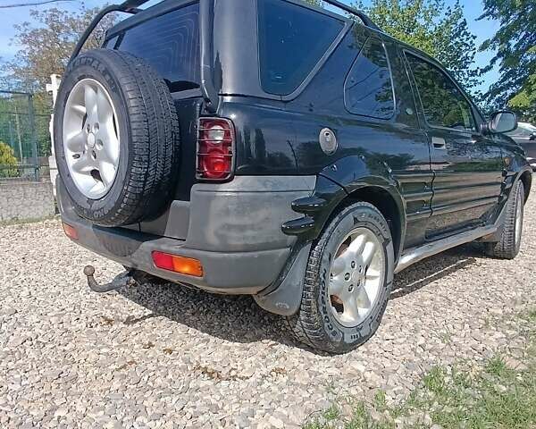 Черный Ленд Ровер Фрилендер, объемом двигателя 1.8 л и пробегом 250 тыс. км за 4200 $, фото 1 на Automoto.ua