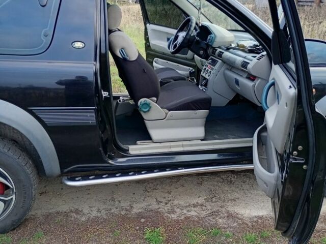 Черный Ленд Ровер Фрилендер, объемом двигателя 1.8 л и пробегом 320 тыс. км за 4650 $, фото 11 на Automoto.ua