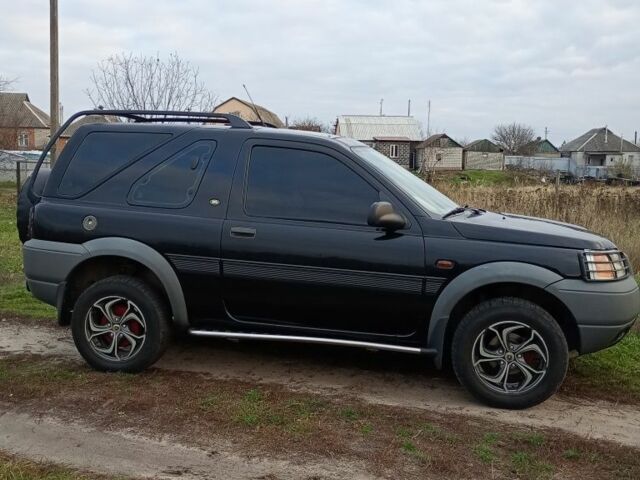 Черный Ленд Ровер Фрилендер, объемом двигателя 1.8 л и пробегом 320 тыс. км за 4650 $, фото 1 на Automoto.ua