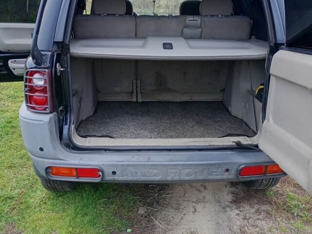 Черный Ленд Ровер Фрилендер, объемом двигателя 1.8 л и пробегом 320 тыс. км за 4650 $, фото 9 на Automoto.ua