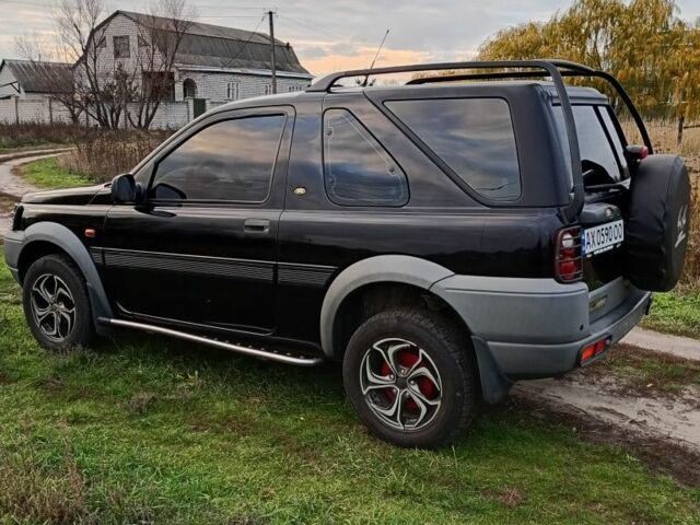 Черный Ленд Ровер Фрилендер, объемом двигателя 1.8 л и пробегом 320 тыс. км за 4650 $, фото 4 на Automoto.ua