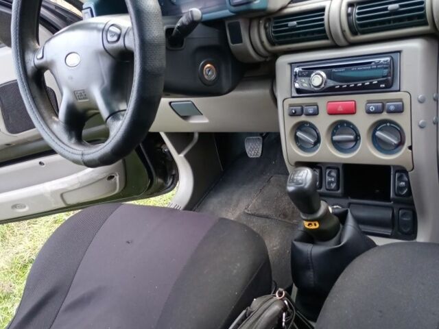 Черный Ленд Ровер Фрилендер, объемом двигателя 1.8 л и пробегом 320 тыс. км за 4650 $, фото 10 на Automoto.ua