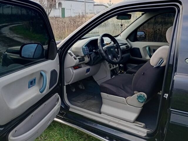 Черный Ленд Ровер Фрилендер, объемом двигателя 1.8 л и пробегом 320 тыс. км за 4650 $, фото 6 на Automoto.ua