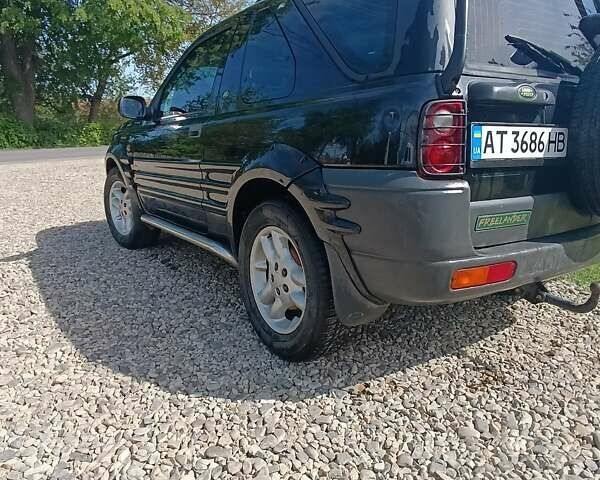 Черный Ленд Ровер Фрилендер, объемом двигателя 1.8 л и пробегом 250 тыс. км за 4200 $, фото 5 на Automoto.ua