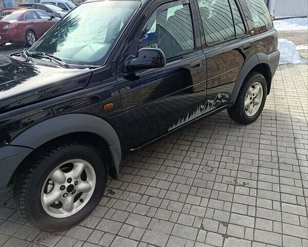 Черный Ленд Ровер Фрилендер, объемом двигателя 1.8 л и пробегом 224 тыс. км за 4999 $, фото 4 на Automoto.ua