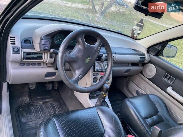 Чорний Ленд Ровер Freelander, об'ємом двигуна 1.8 л та пробігом 327 тис. км за 5500 $, фото 5 на Automoto.ua