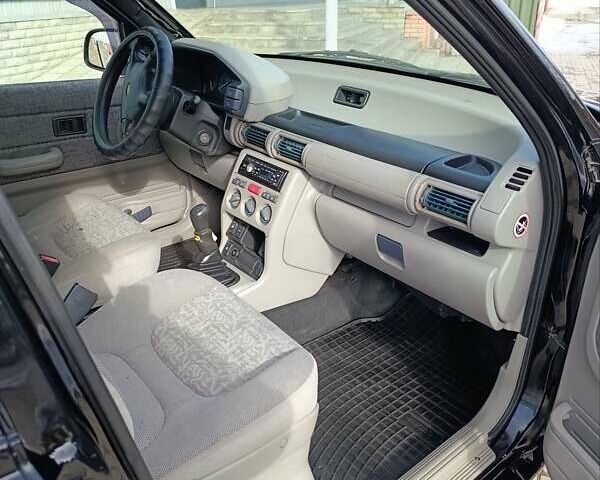 Черный Ленд Ровер Фрилендер, объемом двигателя 1.8 л и пробегом 224 тыс. км за 4999 $, фото 11 на Automoto.ua