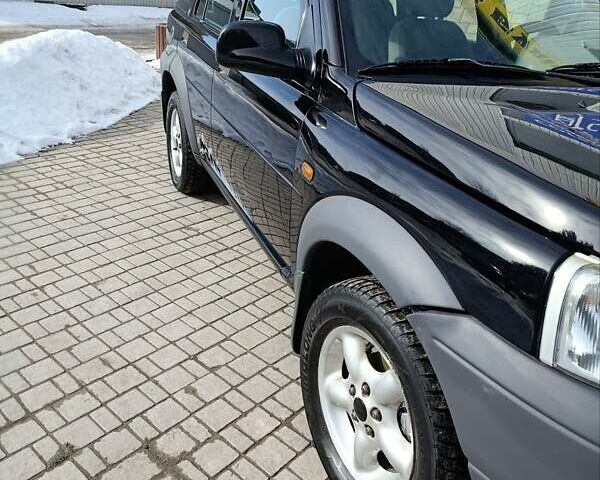 Черный Ленд Ровер Фрилендер, объемом двигателя 1.8 л и пробегом 224 тыс. км за 4999 $, фото 8 на Automoto.ua