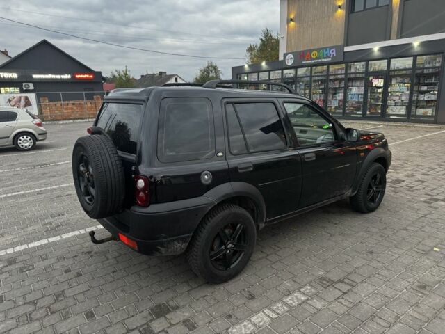 Черный Ленд Ровер Фрилендер, объемом двигателя 2 л и пробегом 100 тыс. км за 4590 $, фото 6 на Automoto.ua