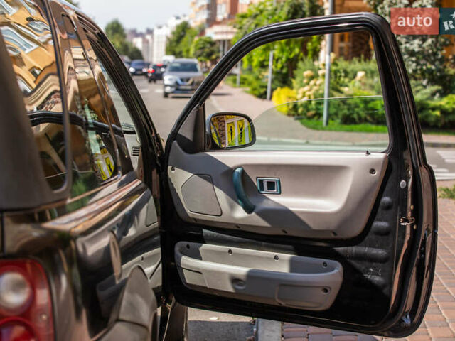 Черный Ленд Ровер Фрилендер, объемом двигателя 1.99 л и пробегом 400 тыс. км за 4500 $, фото 1 на Automoto.ua