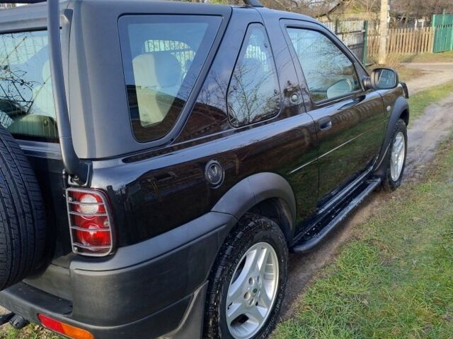 Чорний Ленд Ровер Freelander, об'ємом двигуна 1.8 л та пробігом 240 тис. км за 5500 $, фото 2 на Automoto.ua