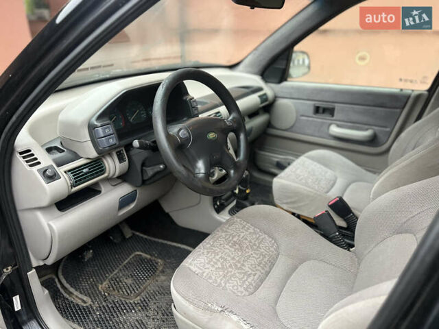 Черный Ленд Ровер Фрилендер, объемом двигателя 1.99 л и пробегом 350 тыс. км за 3950 $, фото 9 на Automoto.ua