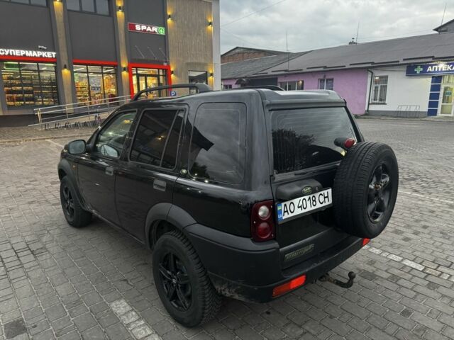 Черный Ленд Ровер Фрилендер, объемом двигателя 2 л и пробегом 100 тыс. км за 4590 $, фото 4 на Automoto.ua