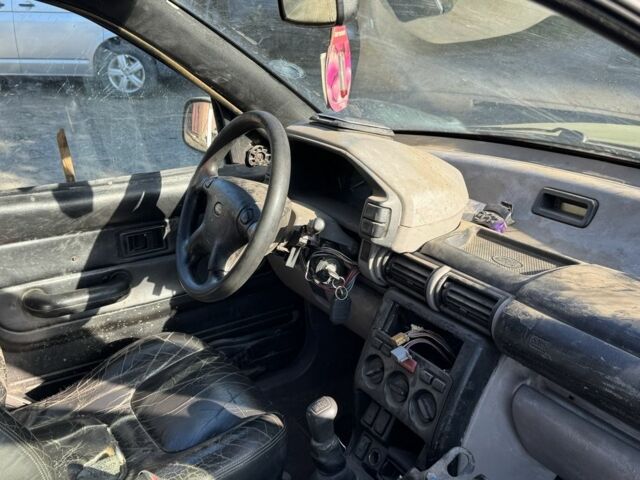 Чорний Ленд Ровер Freelander, об'ємом двигуна 2 л та пробігом 250 тис. км за 701 $, фото 7 на Automoto.ua