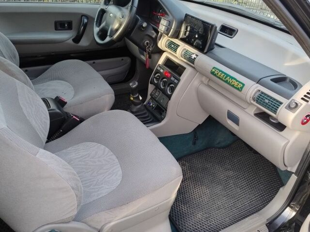Чорний Ленд Ровер Freelander, об'ємом двигуна 1.8 л та пробігом 240 тис. км за 5500 $, фото 12 на Automoto.ua