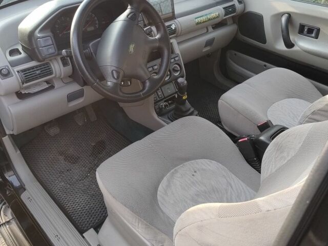 Чорний Ленд Ровер Freelander, об'ємом двигуна 1.8 л та пробігом 240 тис. км за 5500 $, фото 17 на Automoto.ua