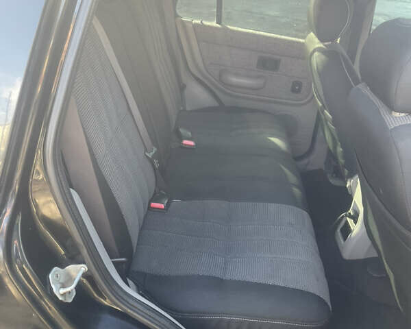 Черный Ленд Ровер Фрилендер, объемом двигателя 1.8 л и пробегом 273 тыс. км за 4900 $, фото 5 на Automoto.ua