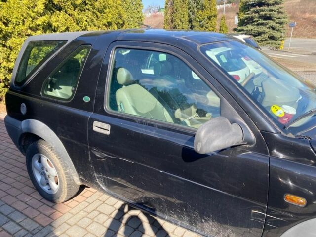 Чорний Ленд Ровер Freelander, об'ємом двигуна 2 л та пробігом 243 тис. км за 1875 $, фото 2 на Automoto.ua